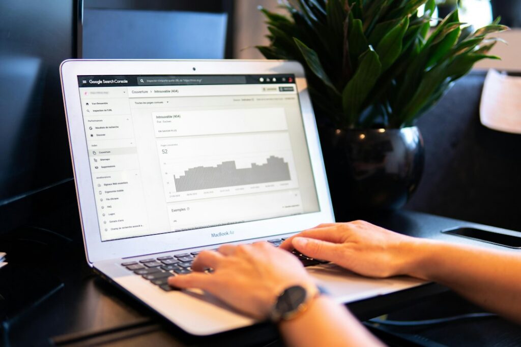 person using AI search on a laptop